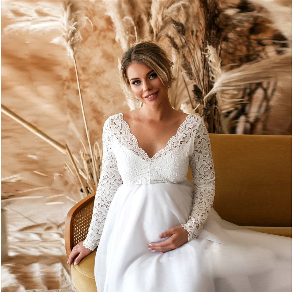 Amara – Spitzen-Maxikleid mit tailliertem Oberteil und ausgestelltem Saum