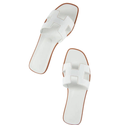 Eva – Flache Slip On Pantoffeln mit Durchbrochene Details