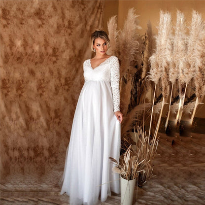 Amara – Spitzen-Maxikleid mit tailliertem Oberteil und ausgestelltem Saum