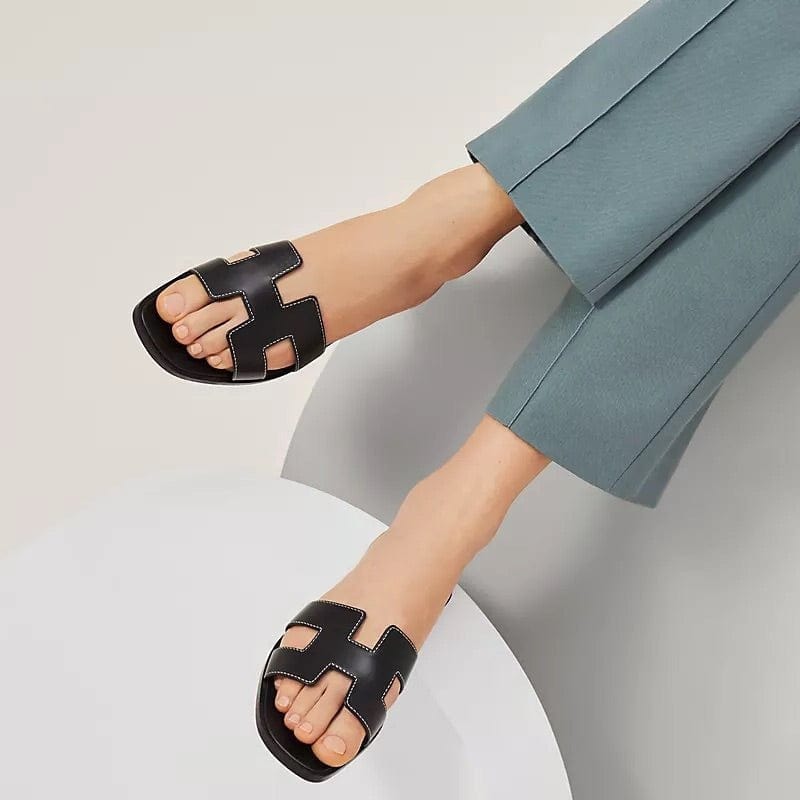 Eva – Flache Slip On Pantoffeln mit Durchbrochene Details