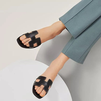 Eva – Flache Slip On Pantoffeln mit Durchbrochene Details